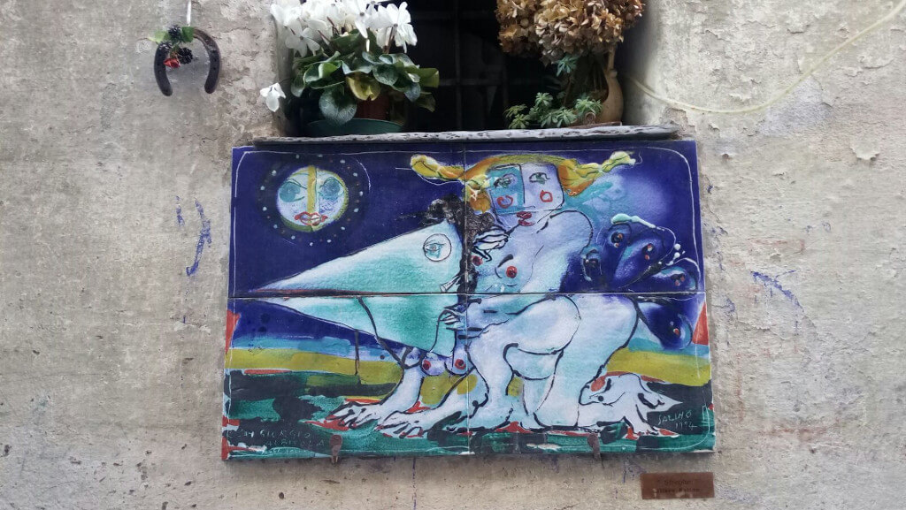 One of the many ceramic plates that adorn the historic centre of Badalucco